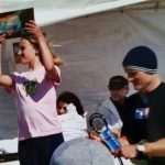 Kassie Gile receiving her surfing trophy